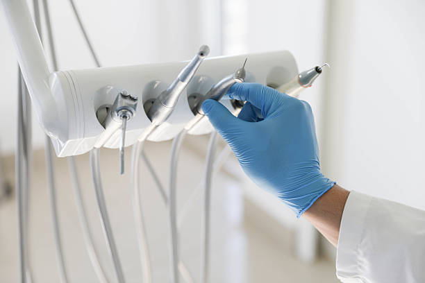 Professional Tooth Extraction technician working in Coppell, TX
